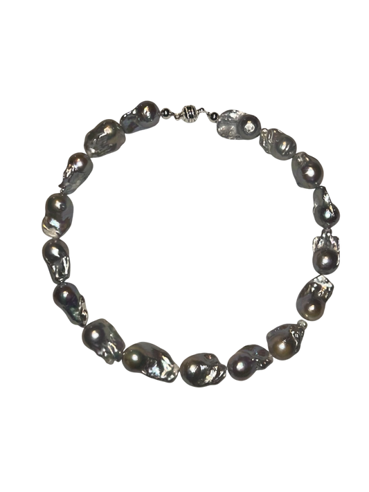 ə. Dolphin Tear Beads